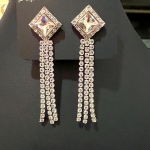 Silver with White Rhinestones. Dangles with Beauty and Confidence